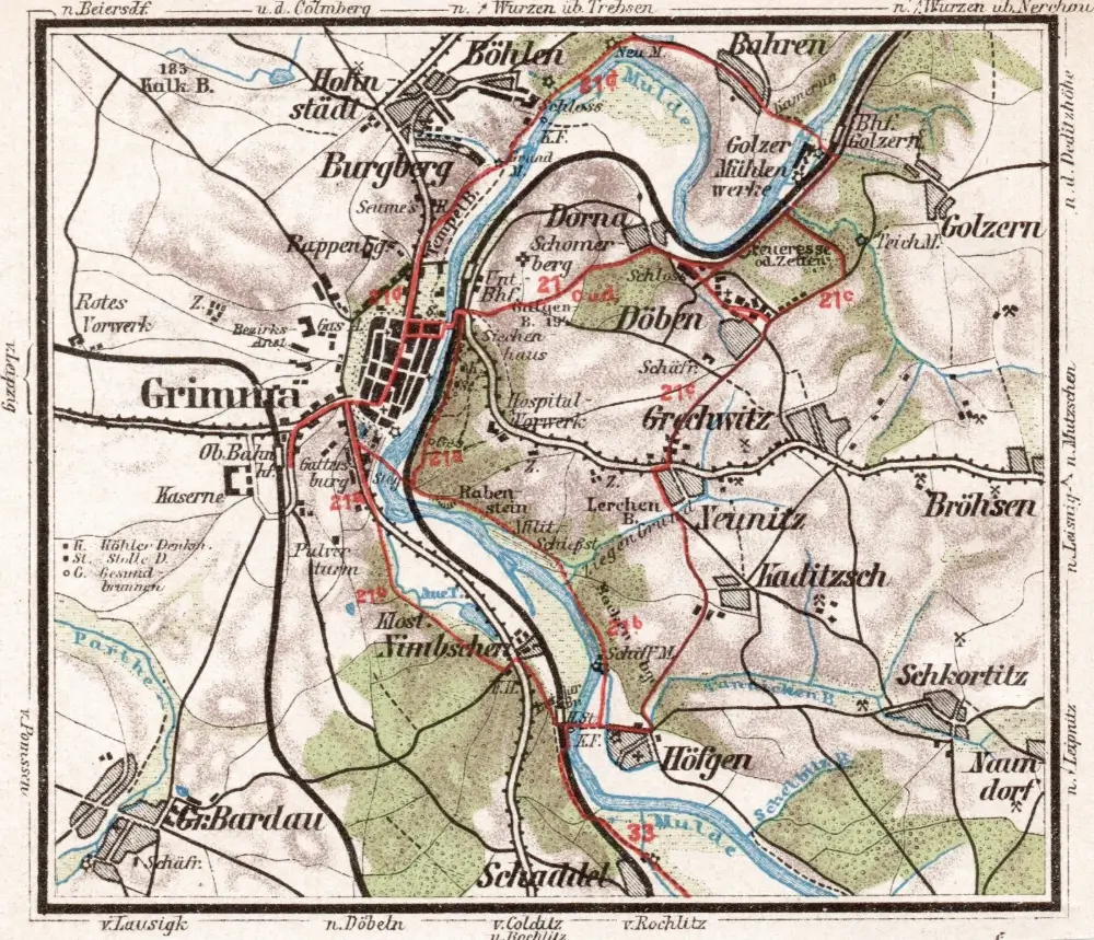 1906 historical map of Grimma showing town layout along the Mulde river with roads, bridges, and nearby villages; printed labels include Grimma, Mulde, and surrounding place names; conveys a calm, archival tone